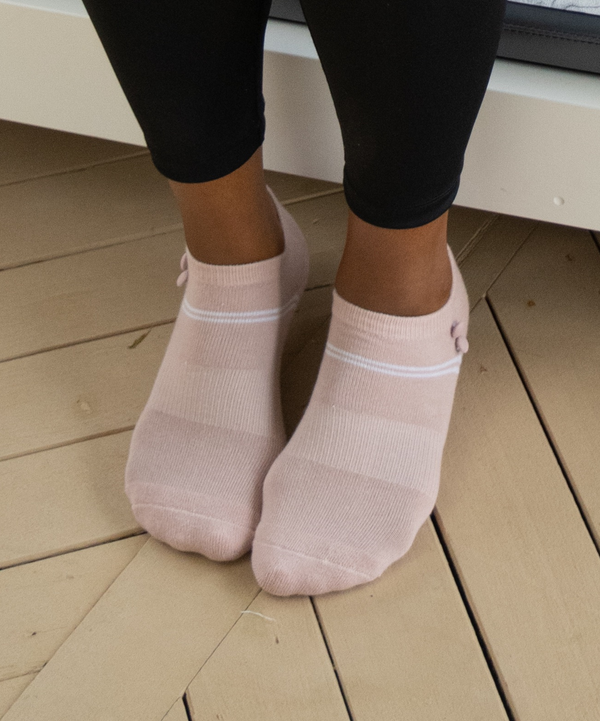 Comfortable and stylish grip socks in blush button color