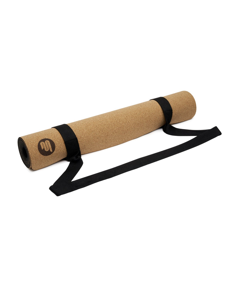  Luxe Eco Yoga Mat - Cork rolled up and ready for transport, showcasing its lightweight and portable design for on-the-go yogis
