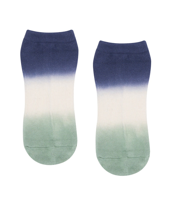 Classic low rise grip socks in vibrant orbit ombré design for added style and stability during workouts