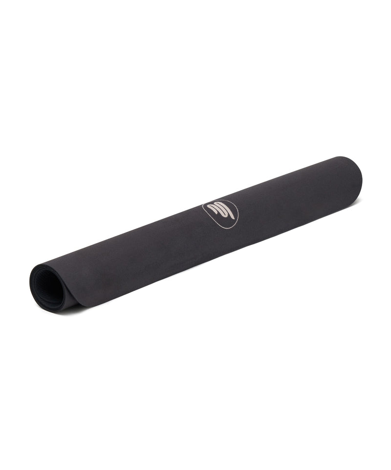 Extra-long and durable Pilates mat with a sleek black finish