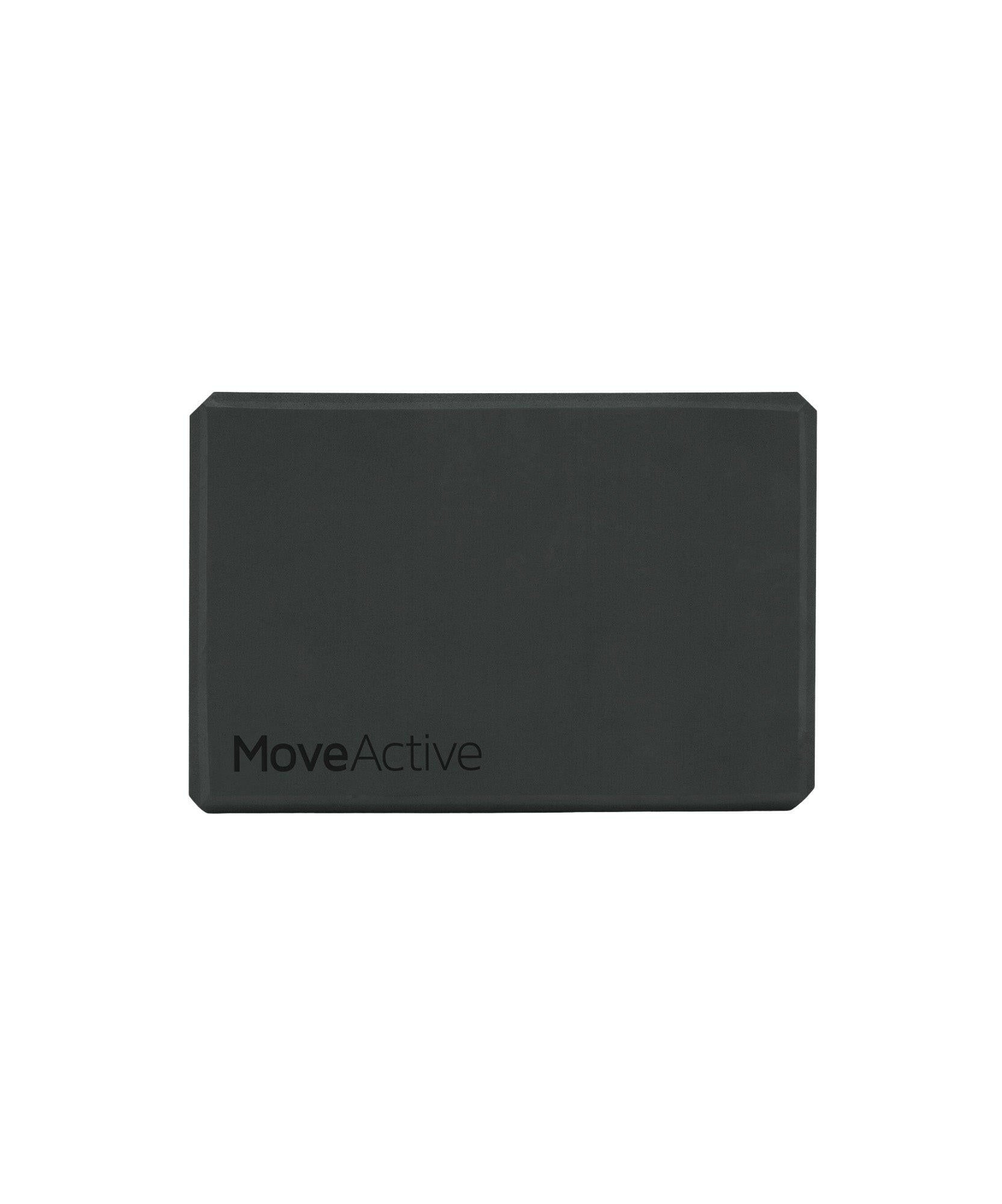 Yoga Block - Black, made of durable foam for support and stability during yoga practice, with a sleek black finish for a modern look and feel