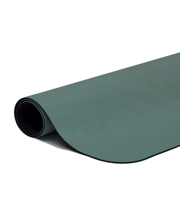 Extra thick and cushioned microfibre reformer mat in a vibrant forest green color