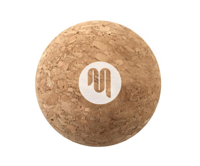 Cork massage ball with textured surface for deep tissue massage and relaxation 