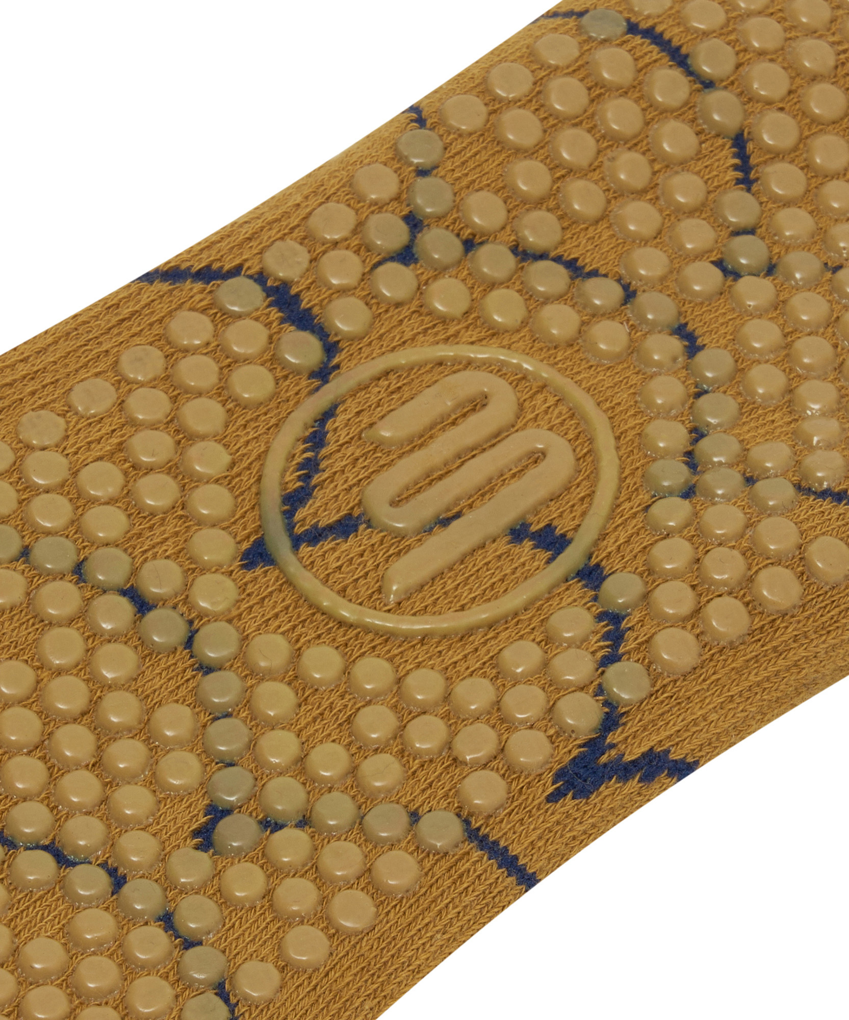 Woman wearing scallop mustard non-slip grip socks while doing yoga